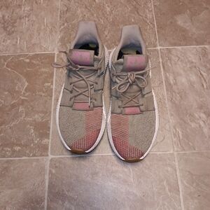 Beige, White, and Pink Athletic Sneakers with Breathable Mesh.